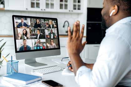 Remote team members participating in a virtual meeting, showcasing teamwork and connectivity